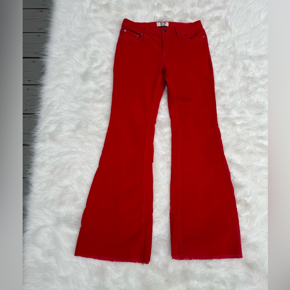 Red corduroy pants by We The Free.  Great condition.